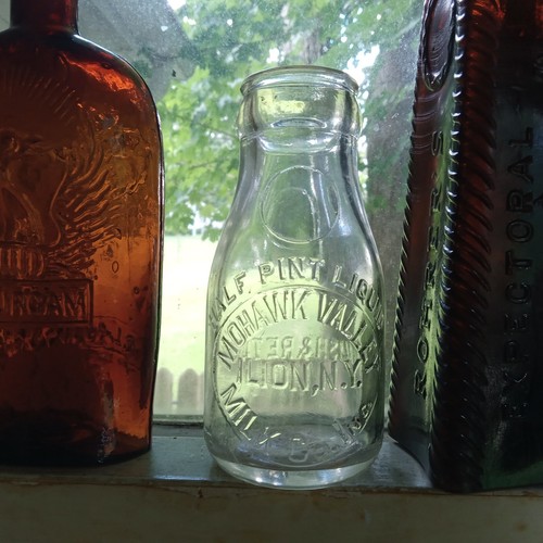 ILION,NY MOHAWK VALLEY MILK CO 1/2 PINTA 1928 BOTELLA DE LECHE CON ANILLO LAP - Imagen 1 de 7
