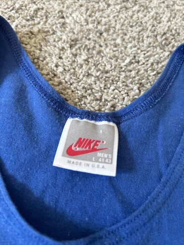 Top sin mangas vintage Nike grande azul EE. UU. etiqueta gris década de 1980 atletismo de punto único - Imagen 3 de 5