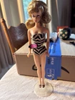 Vintage 35th anniversary 1960s Barbie with tag and stand