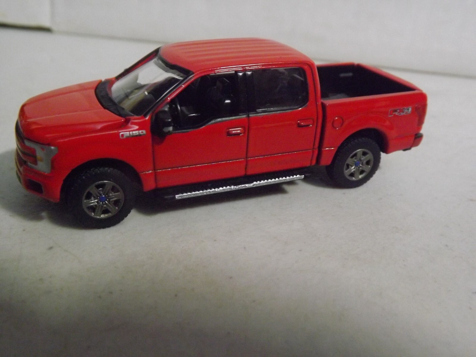AW Auto World Red Ford F-150 FX 4-Door 1/64 Scale Pickup Truck