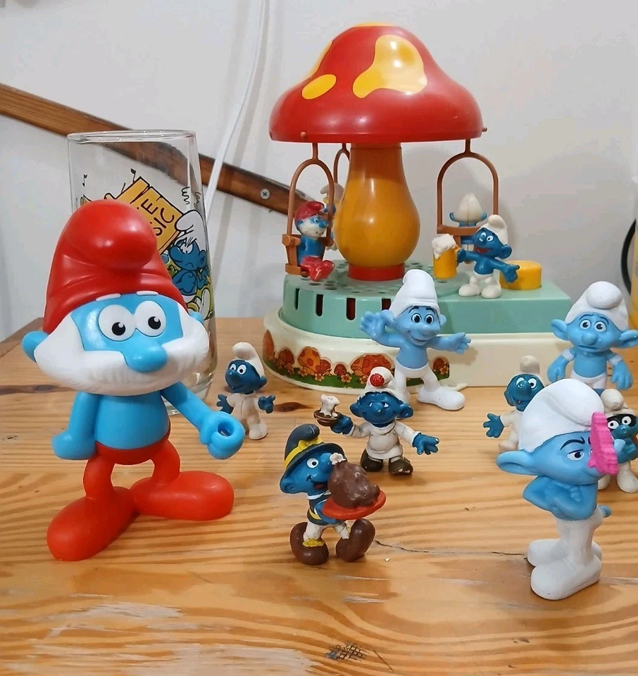 Gran Lote De Juguetes Y Accesorios Pitufo Vidrio Pitufo De Colección Tiovivo Foto 2 de 4