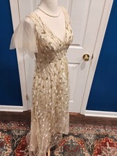 Long Gold Gown sequindress size 2/4.With embroidered leaves.