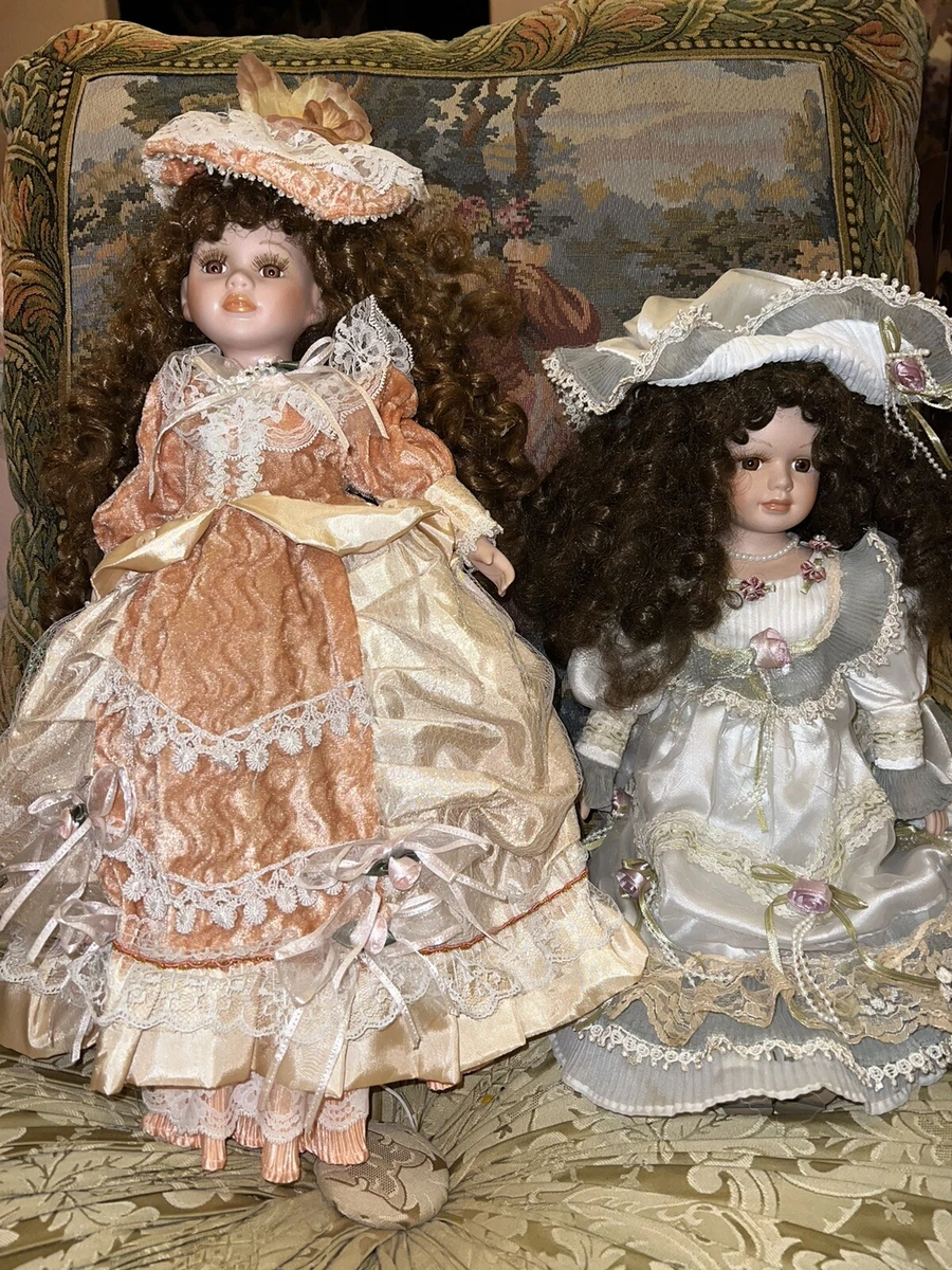 VINTAGE Porcelain doll lot Of 2 Dolls 18”and 16 inch ( nice dresses, hats )