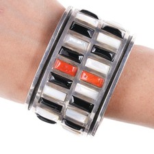 6.875 Jimmie King Jr Navajo sterling silver Coral, onyx, and Shell channel inla