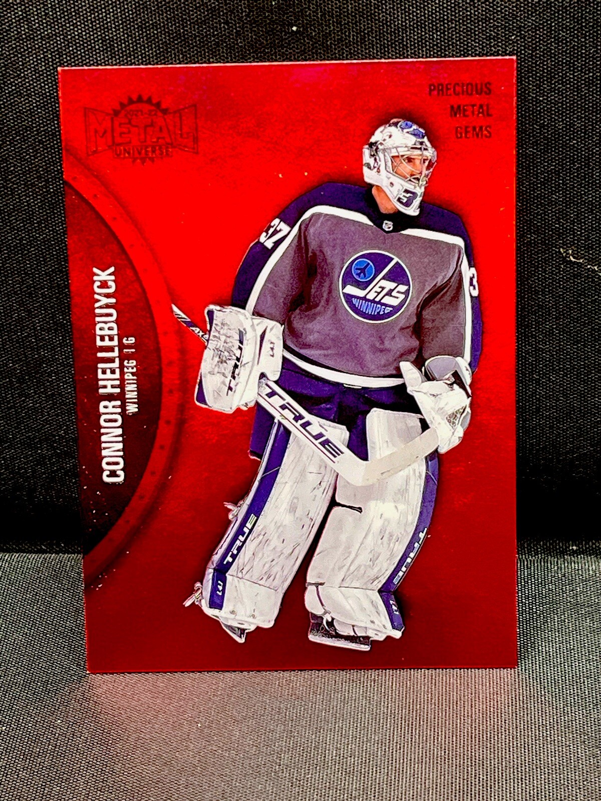 Connor Hellebuyck 2021-22 Metal Universe Precious Metal Gems Red PMG 74/100