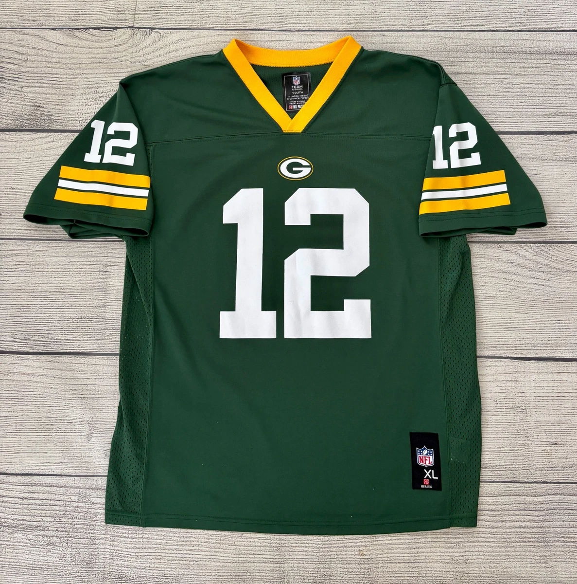 Одежда и сувениры для фанатов спорта Green Bay Packers - огромный