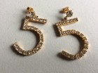 Boucles d'oreilles percées Numéro 5 métal doré Strass scintille