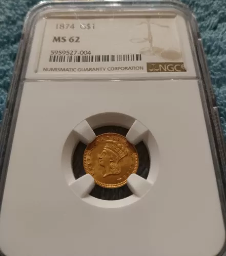 1874 Type 3 gold Dollar, NGC MS-62 - uncirculated lustre and orange-gold tone