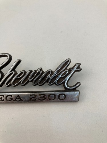 Chevrolet Vega 2300 Emblem Nameplate Badge Metal 1971 to 1975 9870383 OEM - Picture 3 of 4