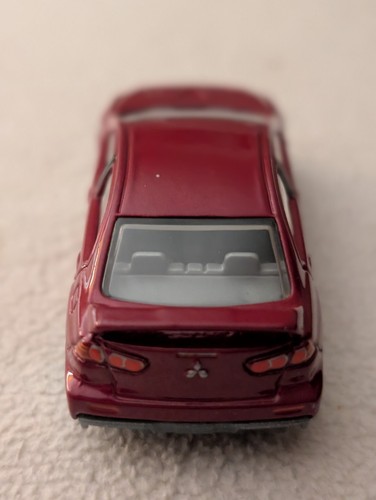 AWESOME 2007 MITSUBISHI LANCER EVOLUTION W SPOILER CHERRY RED 1:64 SCALE HW NOC - Picture 3 of 20