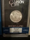 1880-CC  GSA  NGC  MS64  MORGAN DOLLAR  *  Box & COA