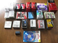 80 Consumer Electronics - DVD'S - CASSETTES - FILM TAPE - DRIVERS - etc. - NEW