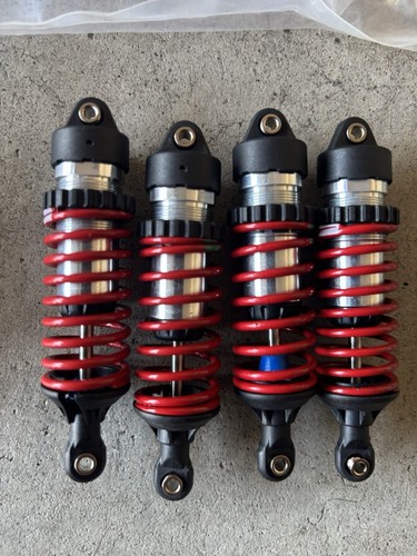 Brand New Traxxas E-Revo & Revo Shocks, Springs, & Long Travel Rocker Sets - Picture 5 of 5