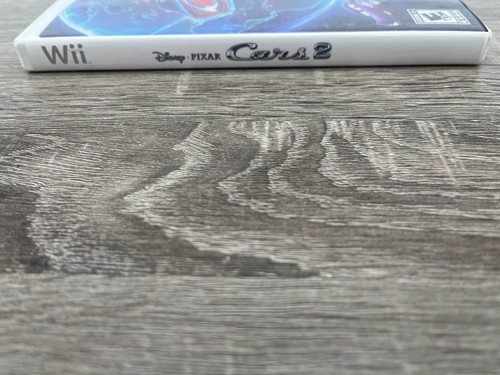 Cars 2: The Video Game (Nintendo Wii, 2011) Complete with Manual CIB - Picture 7 of 7