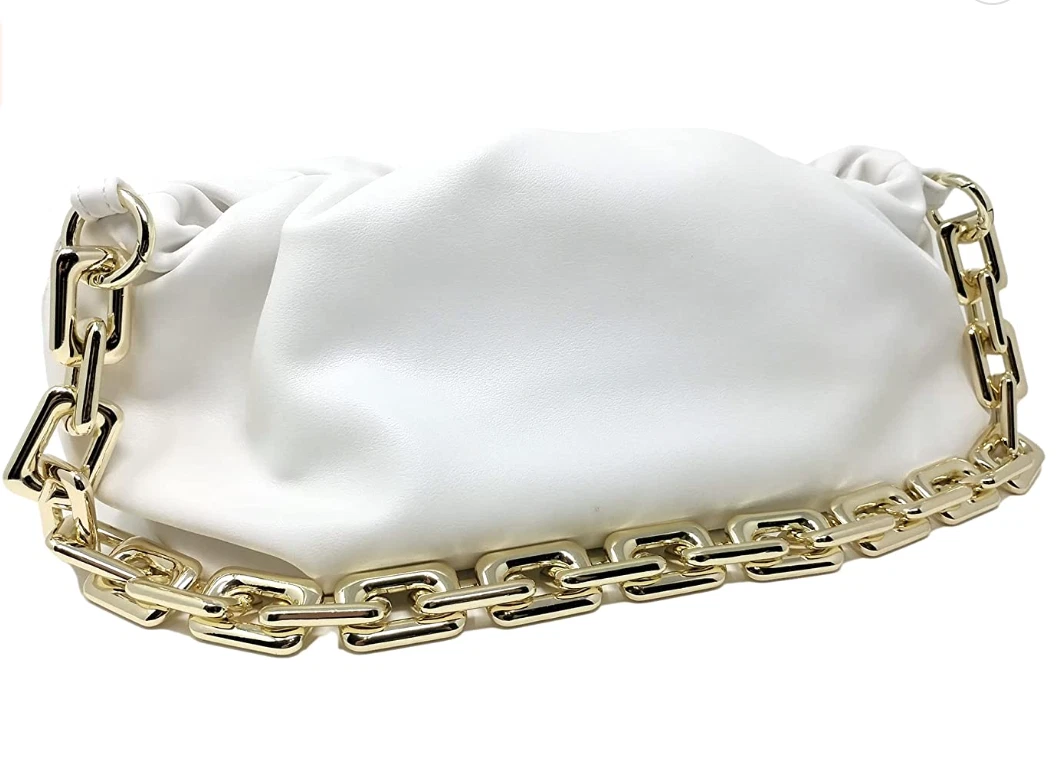 white purse with gold chain