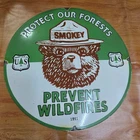 SMOKEY WILDFIRES PORCELAIN ENAMEL SIGN 29 X 29 INCHES