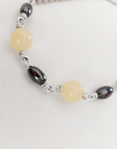 Bracciale cavigliera in acciaio e alluminio  con ematite e giada gialla da 8 mm - Imagen 3 de 7