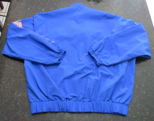 Royal blue Vtg 90s Polo Sport Ralph Lauren jacket with pink embroidered arm logo and elastic waistband.