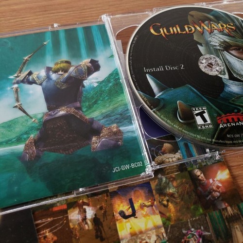 Raro 2005 ORIGINAL GUILD WARS PC Juego, Libro de Arte, Manual, BSO y Más M7 - Imagen 17 de 24