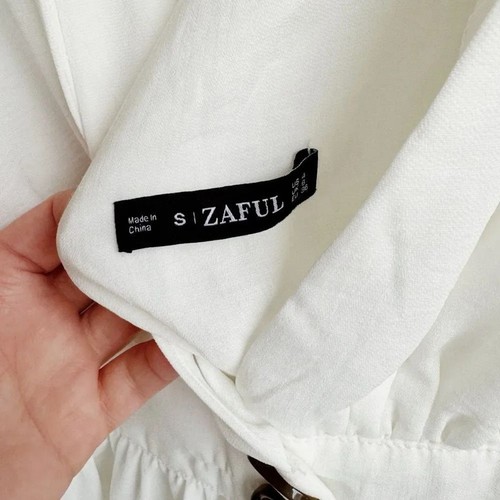 Camiseta sin mangas blanca profunda manga corbata en V pequeña - Imagen 5 de 5