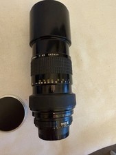 Nikon Nikkor lens 300mm 1:45  black metal body 