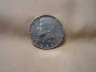 1967 Kennedy Half Dollar 40% Silver Coin! This coin appears to be circulated.