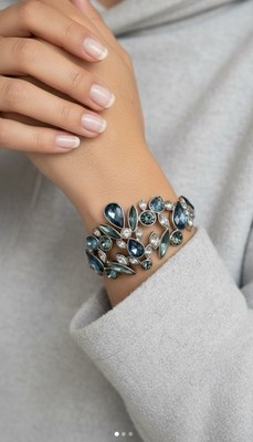 $150 Givenchy silver tone & blue stone bangle bracelet statement