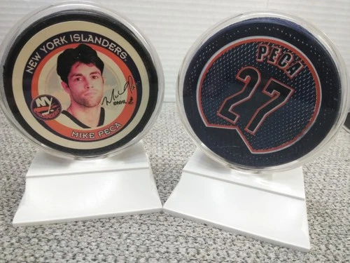 RETIRED #27 Michael Peca  New York Islanders hockey puck in case NHL ( 2PK)