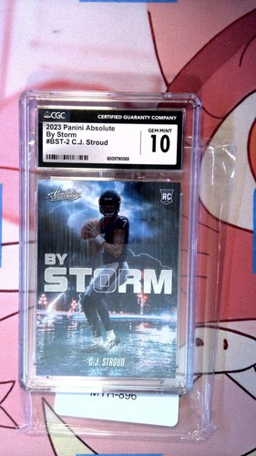 CJ STROUD 2023 ABSOLUTE #BST2 BY STORM CGC 10 (RC) - Picture 1 of 2