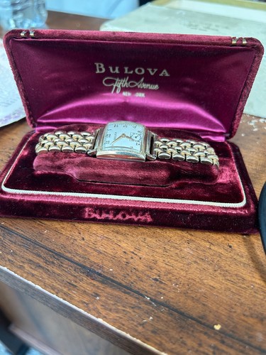 Bulova watch gold plated with origional box and paperwork