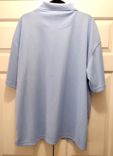 Polo con tacones de alquitrán UNC de Carolina del Norte de la NCAA. Tamaño: XL. Azul. KA Inc. 100% poliéster. - Imagen 2 de 8