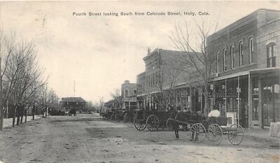H67/ Holly Colorado Postcard c1910 4th Street Stores Horse Wagons  21