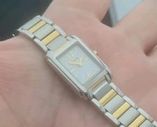 Citizen Eco-Drive ladies watch. Tank case, steel & gold. Solar powered. Bracelet