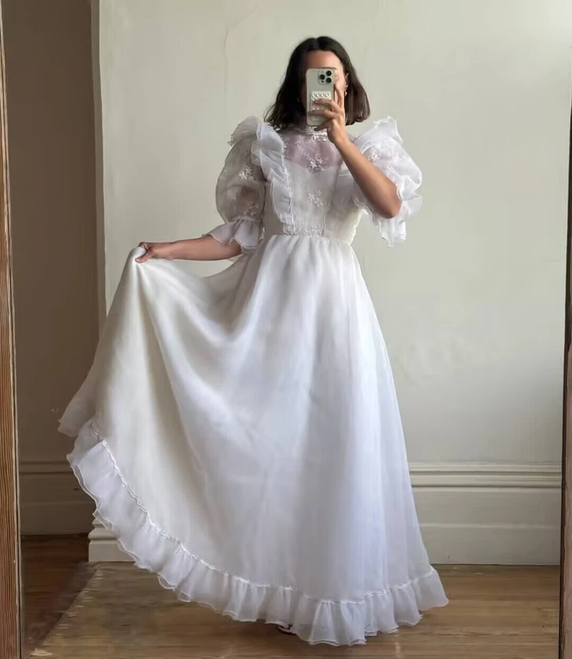 Vestidos de novia vintage victorianos de gasa de manga larga abullonados de los años 50 Foto 2 de 4