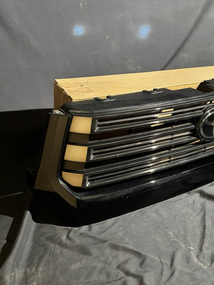 Toyota Tundra 2018-2021 OEM parrilla delantera emblema insignia negro Foto 3 de 4