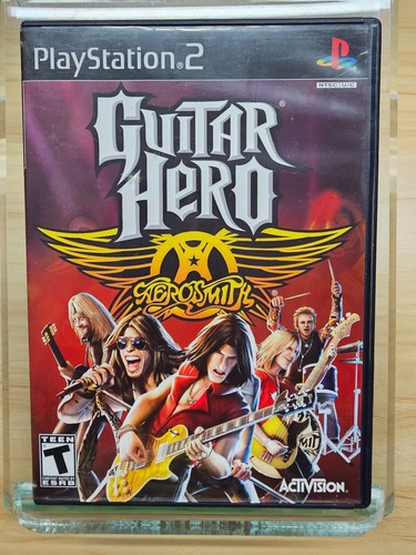 JUEGO PLAYSTATION 2 GUITAR HERO AEROSMITH - CON MANUAL Y LIBRO DE GIRAS - 2008 - Imagen 1 de 4