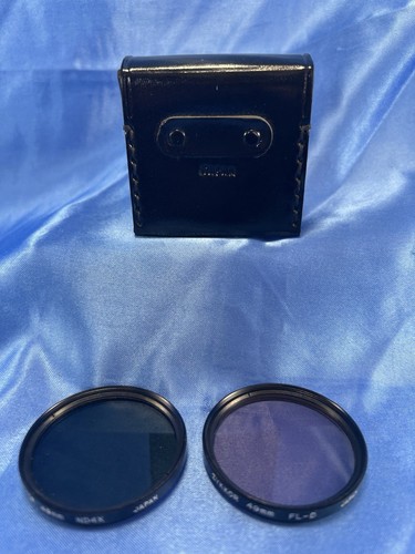 ZYKKOR 49mm TINTED NEUTRAL DENSITY CAMERA FILTERS ND4X & FL-D WITH CASE - Picture 2 of 3