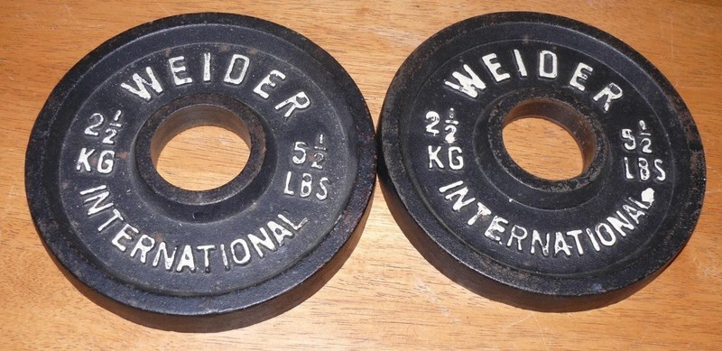 set of 2 vintage Weider International olympic weight weights 2.5kg 5.5lbs plates