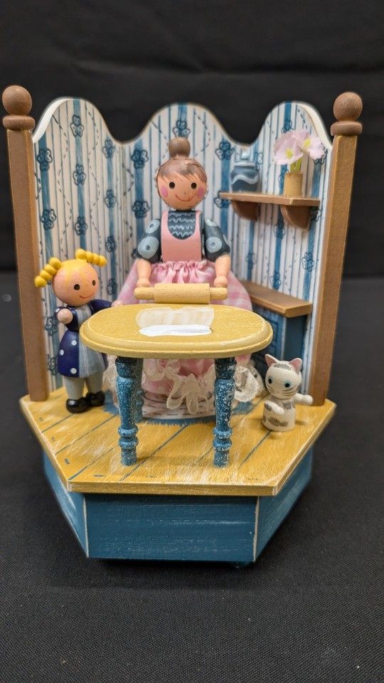 A rare animated 'Cooking Lessons' music box with moving figures — the kind of hyper-specific vintage novelty that makes collectors stop scrolling immediately.