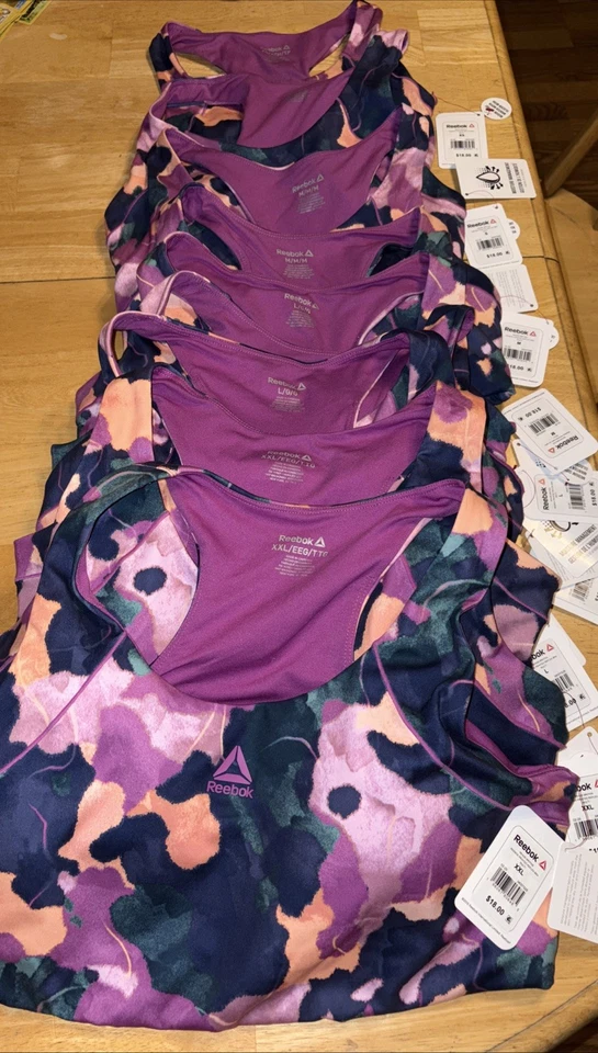 Sujetador deportivo Reebok Reflex de impacto medio para mujer multi púrpura pequeño Foto 4 de 4