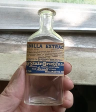 WILLIMANTIC,CONN EARLY 1900 VANILLA EXTRACT THE REXALL STORE LABELED BOTTLE