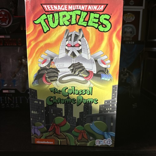 NECA Teenage Mutant Ninja Turtles: The Colossal Chrome Dome Actionfigur...