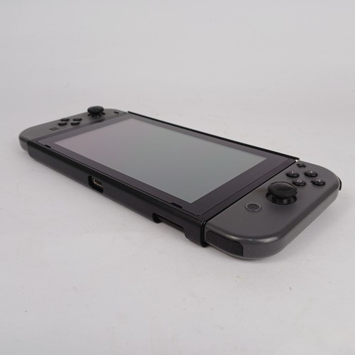 Nintendo Switch Grigia + Joy-Con + Dock + Custodia – Perfettamente Funzionante - Foto 10 di 13