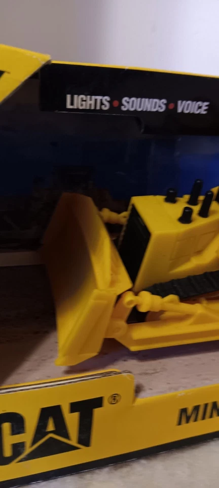 MINI MUDANZA GATO (ORUGA) 5" ILUMINA Y HACE SONIDOS DE CONSTRUCCIÓN Foto 3 de 4