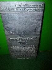 DEALERSHIP AUTOMOTIVE PRINTING PLATES FOR A FORD ESCORT SPORT FOR THE BROCHURES