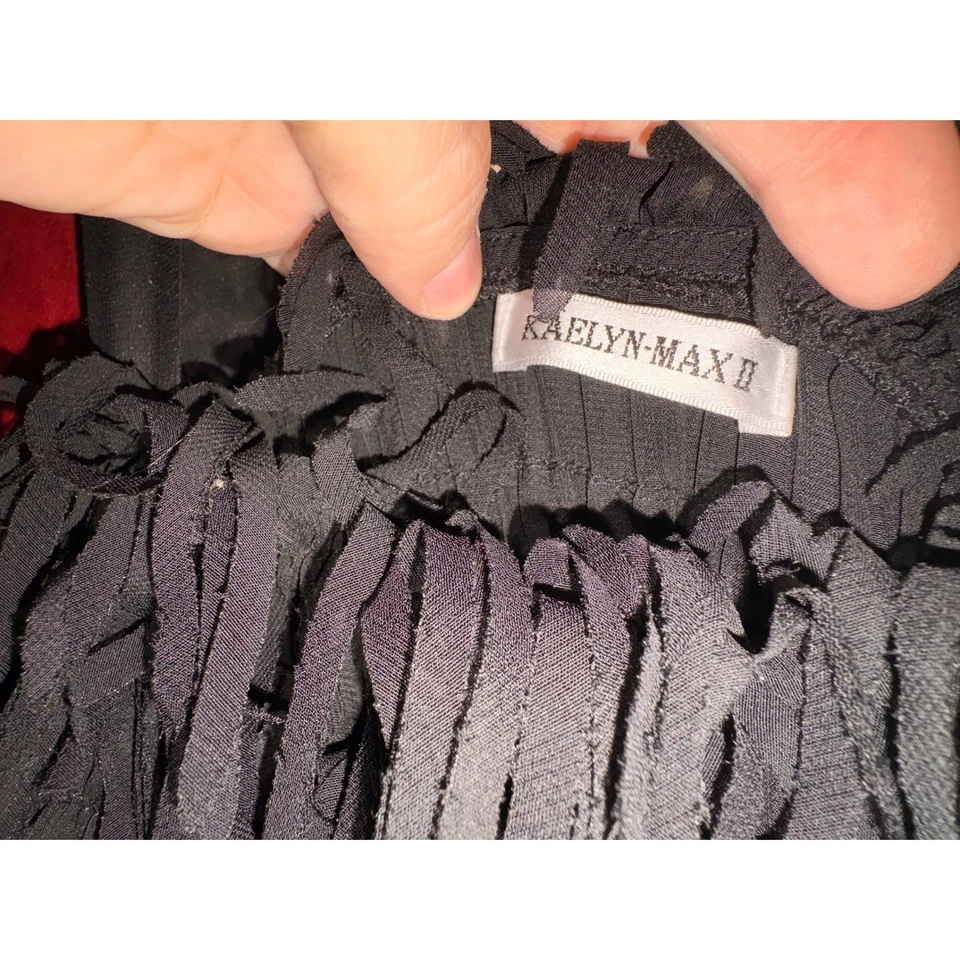 Blusa plisada manga campana top hombro flecos Kaelyn Max II Foto 2 de 4