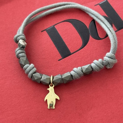Bracciale Dodo Pomellato Borchie Titanio Pinguino Oro Giallo 18kt 750/1000 - Imagen 2 de 2