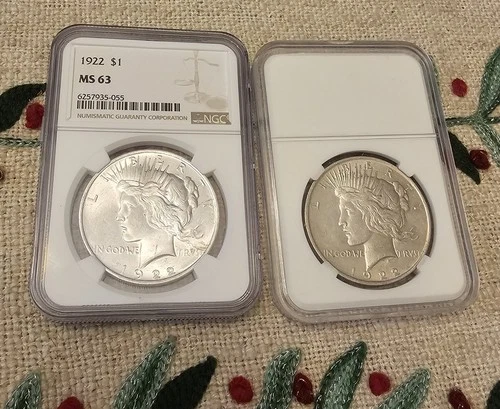 Two 1922 $1 Silver Peace Dollars (One Graded NGC MS63 & The Second not Graded)