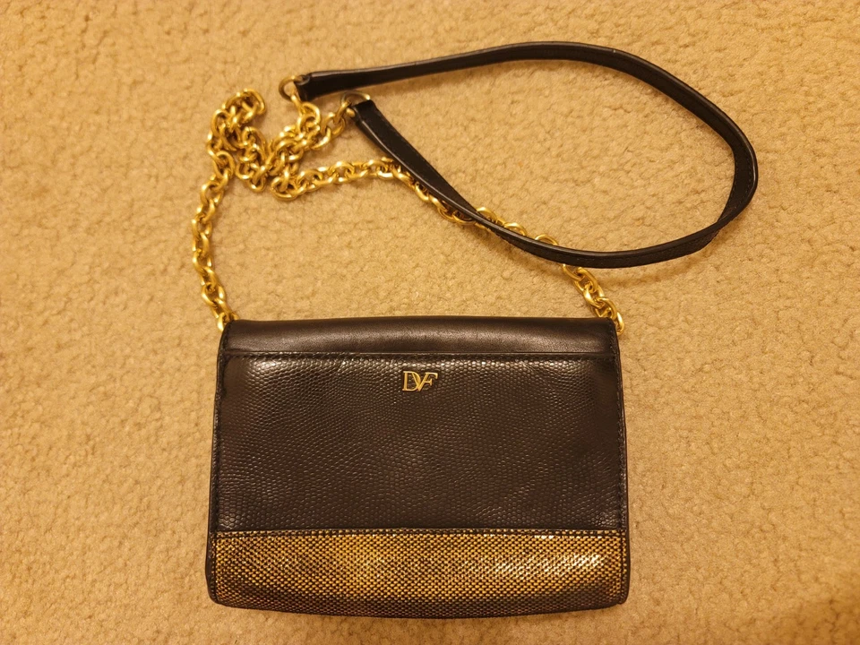 Bolso clutch de cuero Diane Von Furstenberg buen estado negro/dorado Carolina Lips Foto 4 de 4
