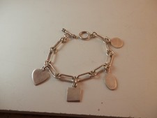 Sterling Silver Charm Bracelet 4 charms toggle clasp 7mm 27.4 grams 925
